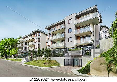 Full length view of rental apartment business View Large Photo Image Stock Photo - Full length view of rental apartment business. Fotosearch