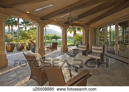 Stock Photography - Furniture in patio of luxury villa. Fotosearch