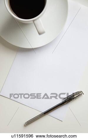 High angle view of coffee cup with pen on a blank paper View Large Photo Image Stock Photograph - High angle view of coffee cup with pen on a blank paper. Fotosearch