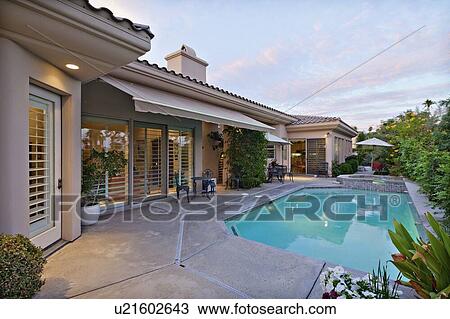 House Exterior with swimming pool View Large Photo Image Stock Image - House Exterior with swimming pool. Fotosearch