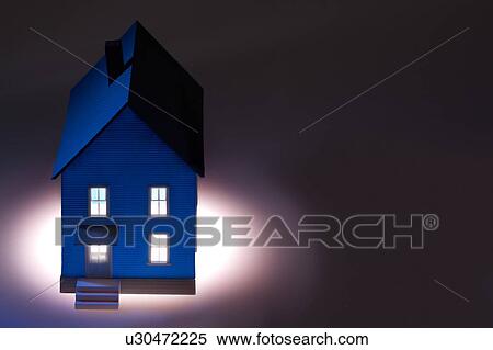 Stock Photography - Illuminated model house. Fotosearch