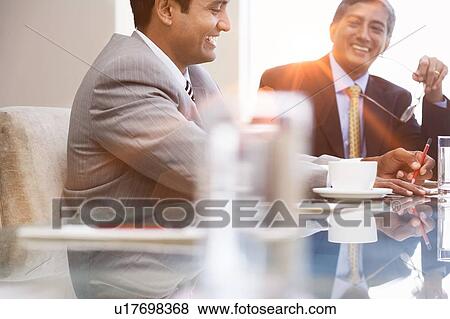 Stock Photo - Indian businessmen in meeting. Fotosearch