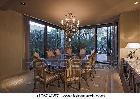 Stock Photo - Interior of a dining room in a luxury villa. Fotosearch