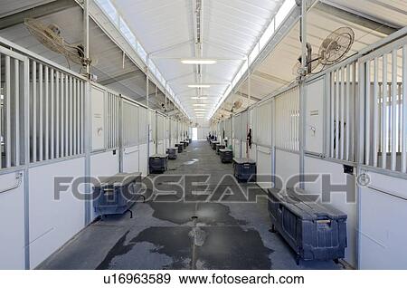 Stock Photo - Interior of stables. Fotosearch