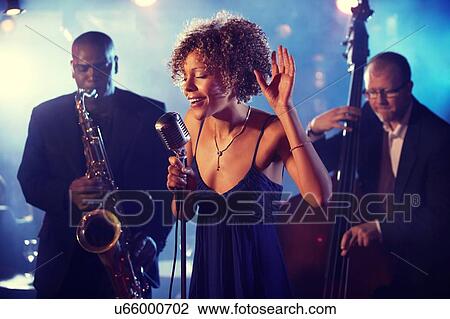 Jazz Band playing on Stage View Large Photo Image Stock Image - Jazz Band playing on Stage. Fotosearch