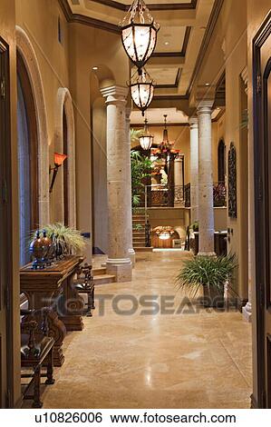 Lights hanging in hallway of luxury mansion View Large Photo Image Stock Photograph - Lights hanging in hallway of luxury mansion. Fotosearch