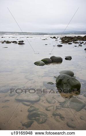 Stock Photo - Looking over the shallows out to the North Atlantic Ocean. Fotosearch