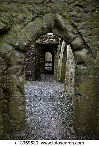 Looking through doorway in Quin Abbey, Ireland View Large Photo Image Stock Image - Looking through doorway in Quin Abbey, Ireland. Fotosearch