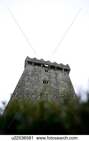 Stock Image - Looking up at Blarney Castle. Fotosearch
