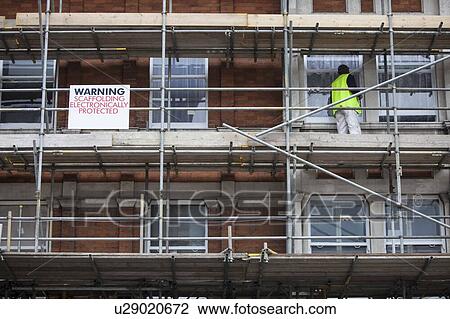 Stock Image - Low angle view of scaffolding. Fotosearch