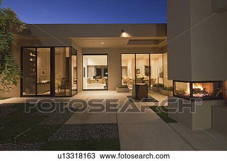 Stock Image - Luxurious villa in evening. Fotosearch