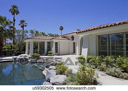 Luxurious villa with swimming pool View Large Photo Image Stock Photography - Luxurious villa with swimming pool. Fotosearch