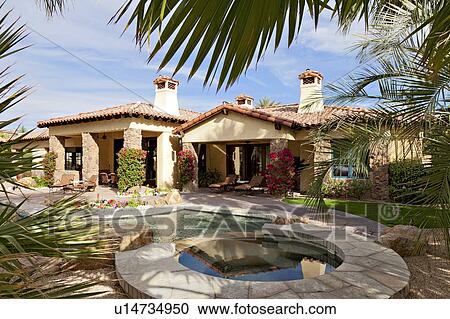 Luxury villa with swimming pool in foreground View Large Photo Image Stock Image - Luxury villa with swimming pool in foreground. Fotosearch