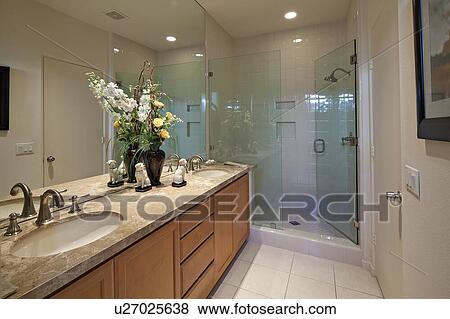 Stock Photo - Modern bathroom in luxury villa. Fotosearch