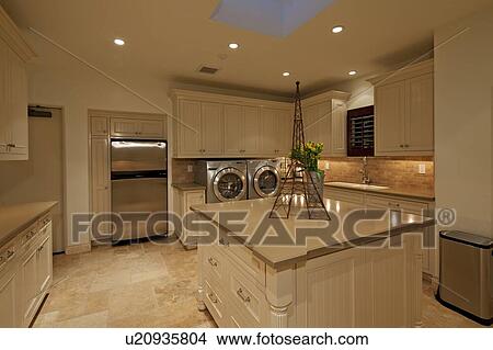 Picture - Modern kitchen counter with showpiece in manor house. Fotosearch
