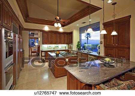 Modern kitchen in luxury mansion View Large Photo Image Stock Photo - Modern kitchen in luxury mansion. Fotosearch