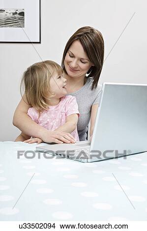 Mother and Child View Large Photo Image Picture - Mother and Child. Fotosearch