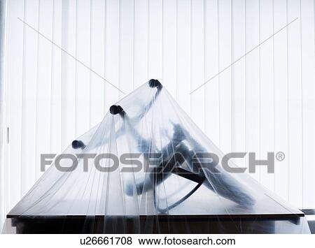 Office chair under curtain View Large Photo Image Stock Photo - Office chair under curtain. Fotosearch