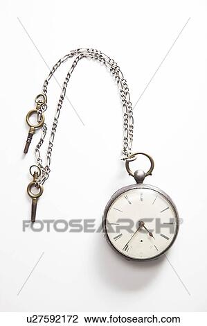 Old-fashioned pocket watch over white background View Large Photo Image Stock Image - Old-fashioned pocket watch over white background. Fotosearch