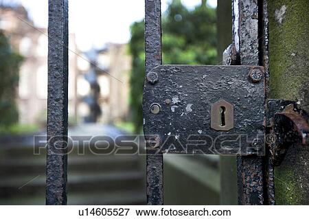 Stock Photo - Old gate and lock. Fotosearch