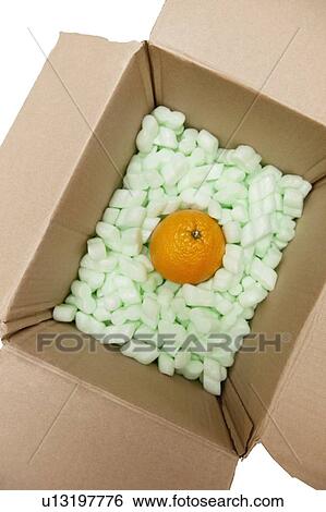 Open cardboard box with packing peanuts and orange in it View Large Photo Image Stock Photograph - Open cardboard box with packing peanuts and orange in it. Fotosearch