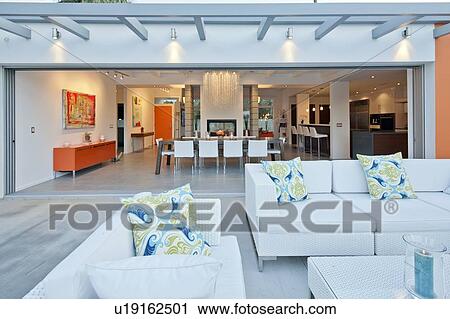 Outdoor seating furniture in patio of luxury mansion View Large Photo Image Stock Image - Outdoor seating furniture in patio of luxury mansion. Fotosearch