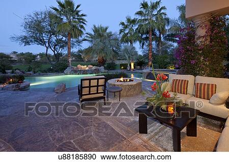 Outdoor seating furniture in patio of manor house View Large Photo Image Stock Image - Outdoor seating furniture in patio of manor house. Fotosearch
