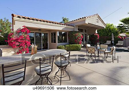 Outdoors seating furniture of luxury manor house View Large Photo Image Stock Photograph - Outdoors seating furniture of luxury manor house. Fotosearch