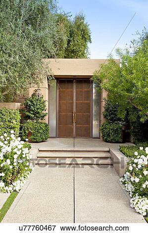 Stock Photo - Path leading to double front door. Fotosearch