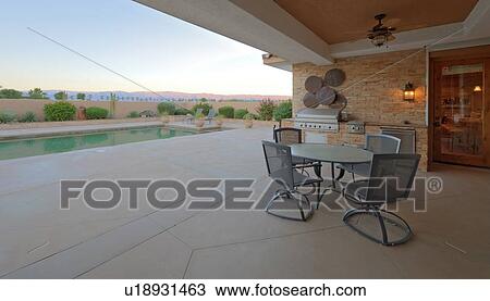 Patio and barbecue area with view to pool View Large Photo Image Stock Image - Patio and barbecue area with view to pool. Fotosearch