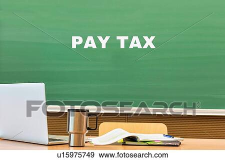 Pay Tax written on black board in classroom View Large Photo Image Stock Photo - Pay Tax written on black board in classroom. Fotosearch