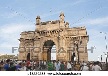 Stock Photo - People at Gateway of India, Mumbai's tourist district and most famous landmark. Fotosearch