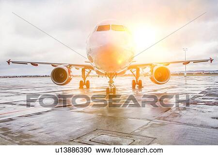 Photo of airplane in airport View Large Photo Image Stock Image - Photo of airplane in airport. Fotosearch