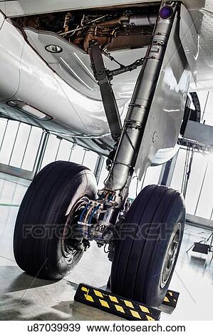 Photo of airplane wheels in airport View Large Photo Image Stock Photo - Photo of airplane wheels in airport. Fotosearch