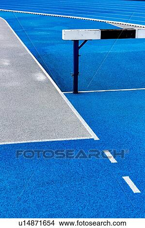 Picture - Photo of blue running tracks. Fotosearch