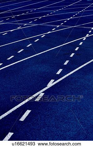 Stock Image - Photo of blue stadium tracks. Fotosearch