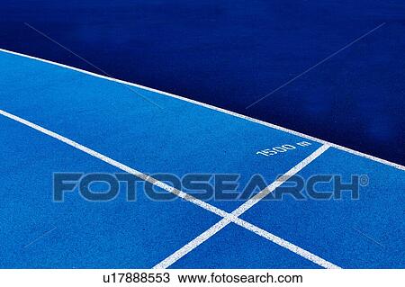 Stock Image - Photo of blue stadium tracks. Fotosearch