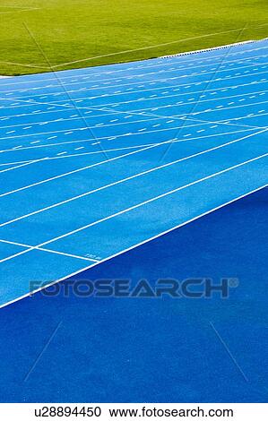 Stock Image - Photo of blue stadium tracks. Fotosearch