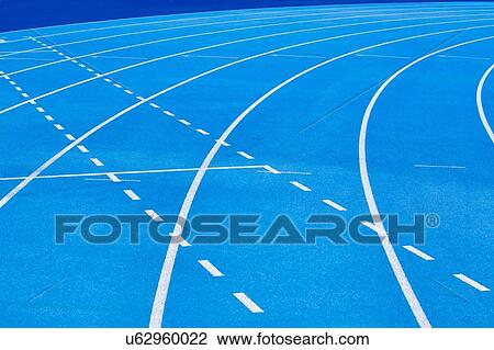 Stock Image - Photo of blue stadium tracks. Fotosearch