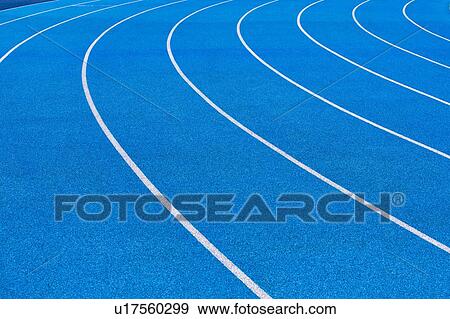 Stock Photo - Photo of blue stadium tracks. Fotosearch