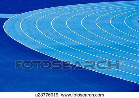 Stock Photo - Photo of blue stadium tracks. Fotosearch