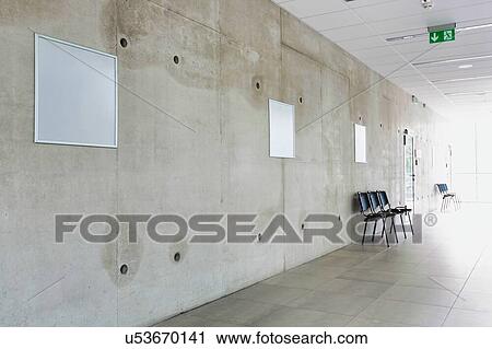 Stock Image - Photo of chairs in corridor at school. Fotosearch