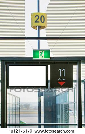 Photo of empty boarding gate 11 in airport View Large Photo Image Stock Photo - Photo of empty boarding gate 11 in airport. Fotosearch