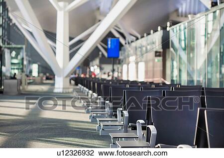 Photo of empty boarding gate in airport View Large Photo Image Stock Image - Photo of empty boarding gate in airport. Fotosearch