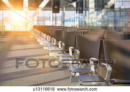Photo of empty boarding gate in airport View Large Photo Image Stock Photo - Photo of empty boarding gate in airport. Fotosearch