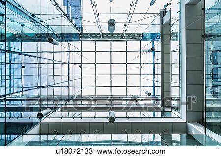 Stock Image - Photo of modern glass ceiling in school building. Fotosearch