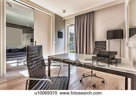 Photo of modern office room in rental business apartment View Large Photo Image Stock Image - Photo of modern office room in rental business apartment. Fotosearch