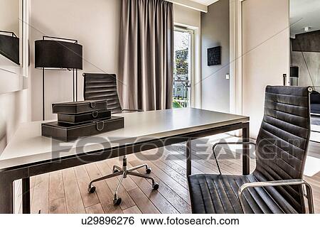 Stock Photograph - Photo of modern office room in rental business apartment. Fotosearch