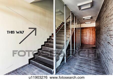 Photo of modern staircase in rental apartment business View Large Photo Image Stock Photograph - Photo of modern staircase in rental apartment business. Fotosearch