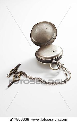 Stock Photo - Pocket watch with chain over white background. Fotosearch